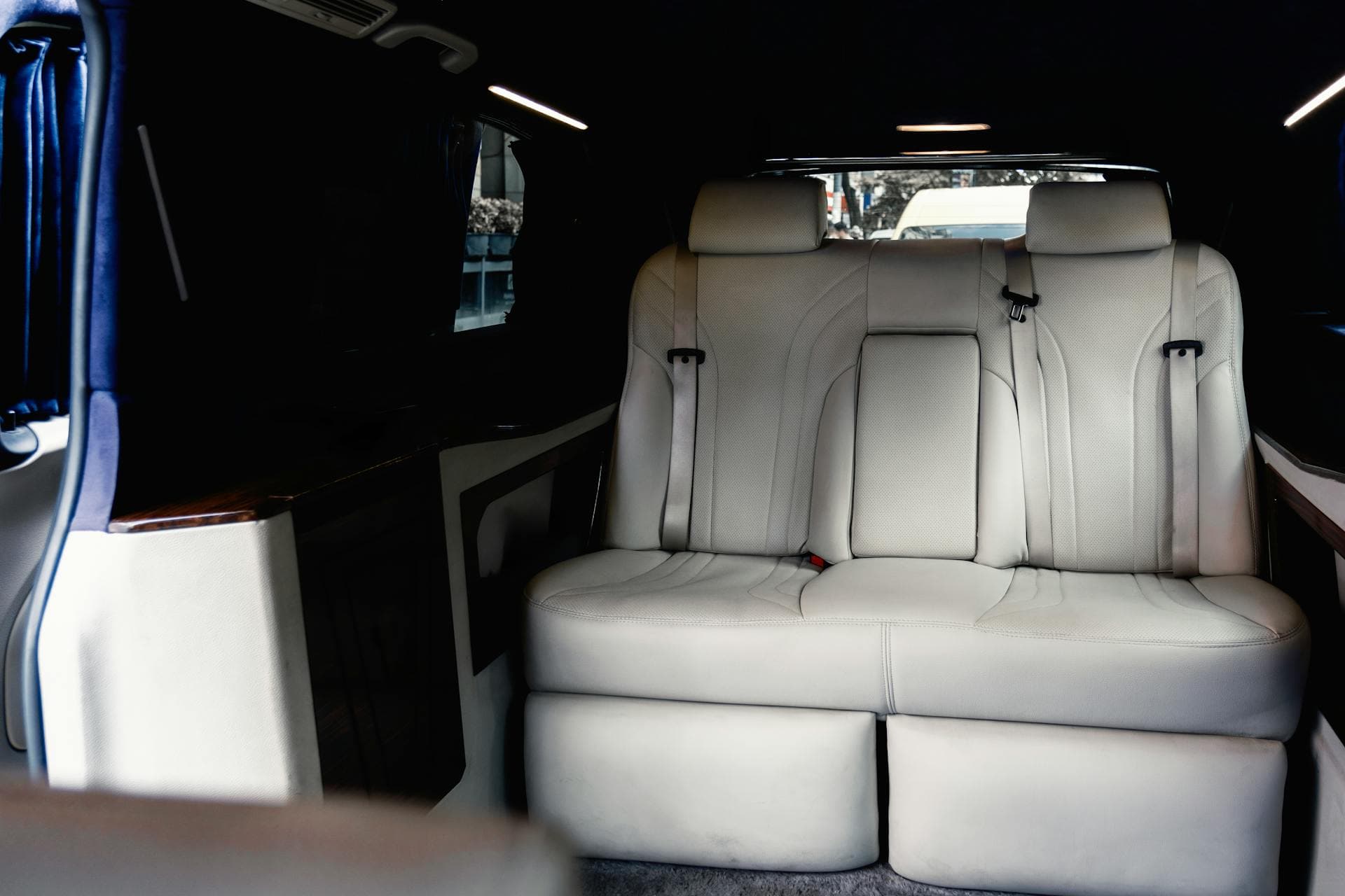 Plush luxury sedan interior with leather seating, Adelaide limo hire child-seat policy
