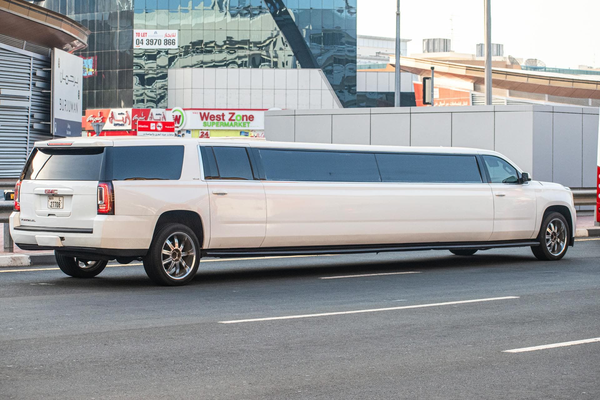 White GMC Yukon XL SUV-stretch limousine, Adelaide vehicle class comparison