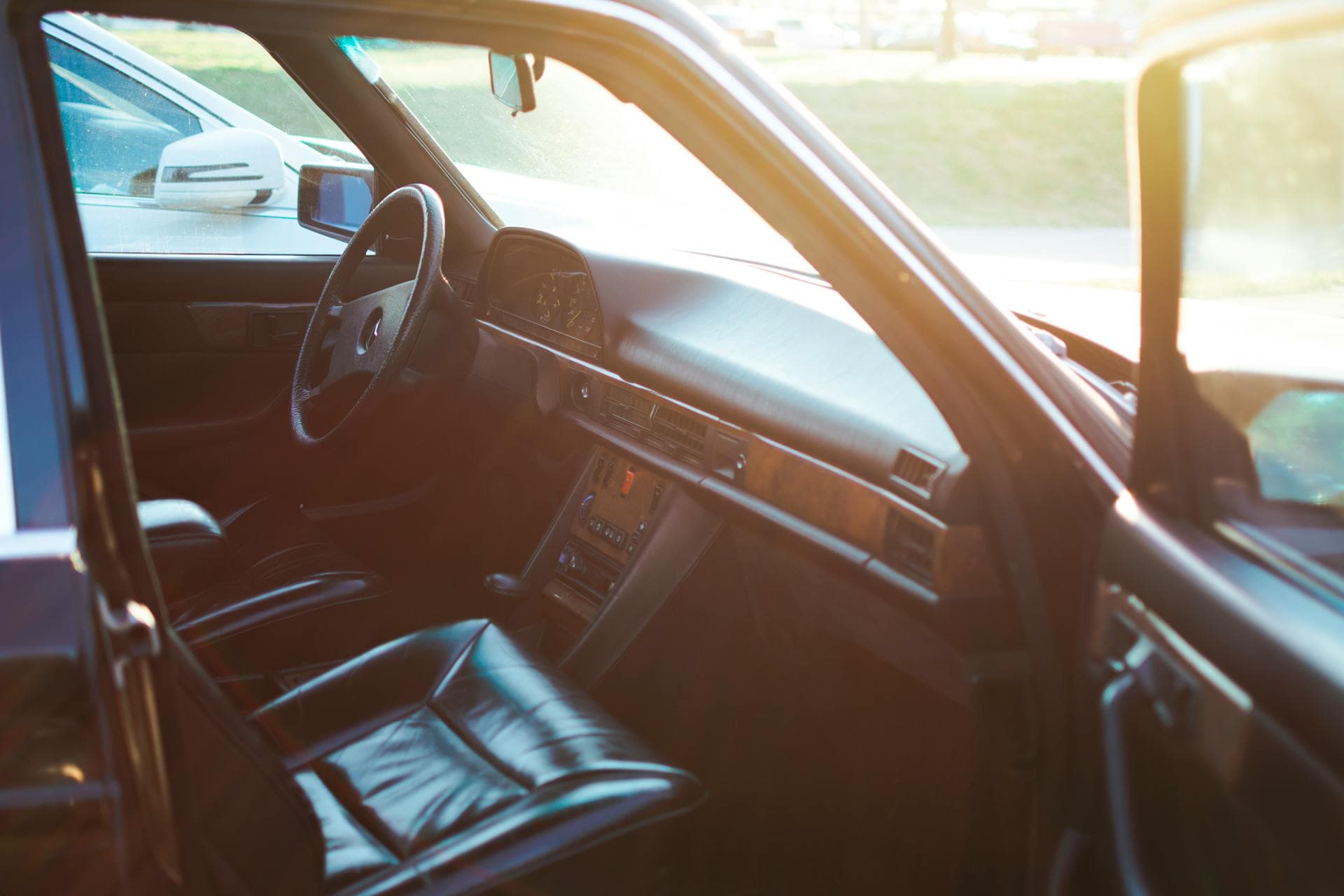Luxurious car cabin with warm sunlight through window, Adelaide Year 12 formal cost guide