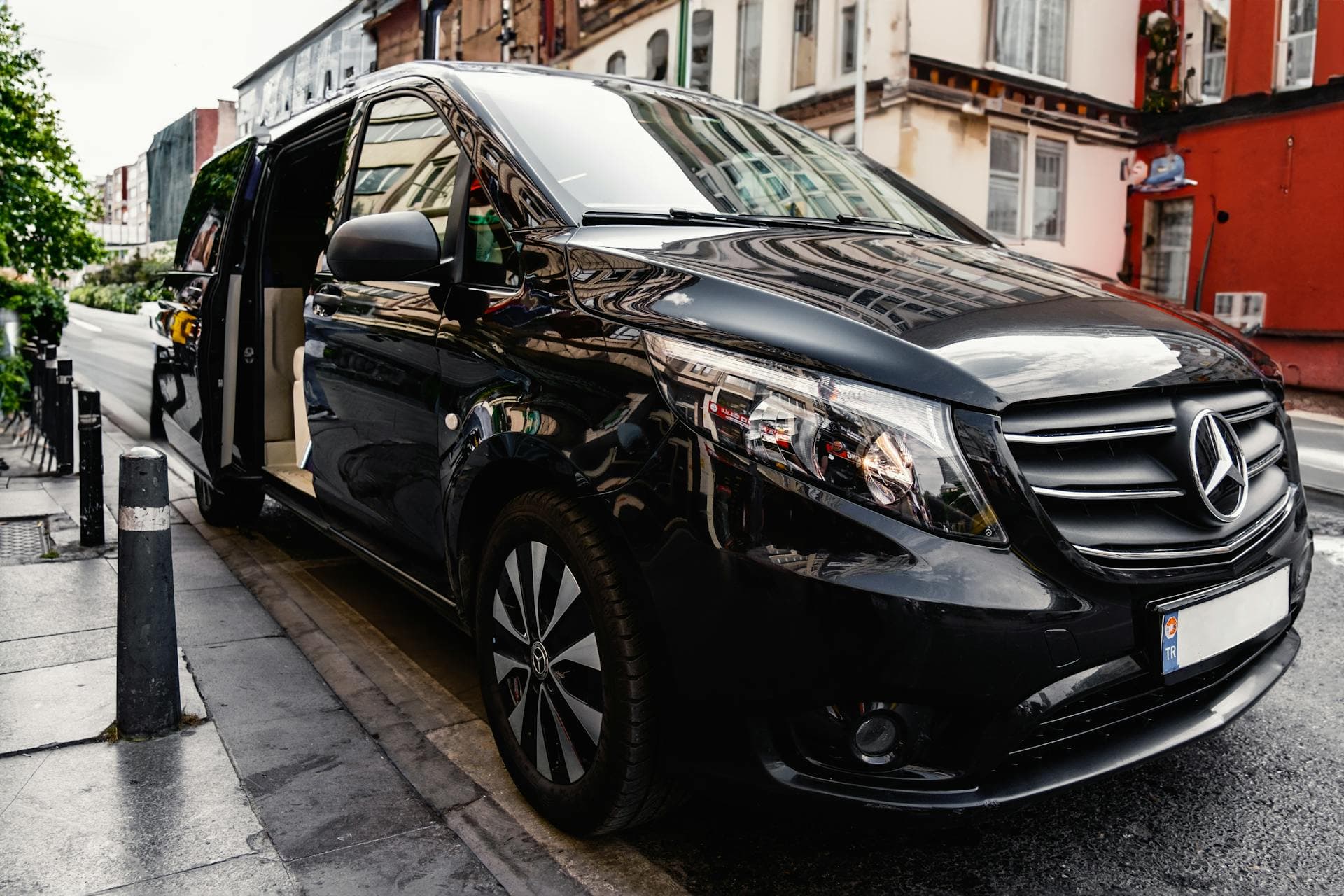 Black Mercedes-Benz V-Class people-mover with side door open, Adelaide 4 to 7 passenger fleet