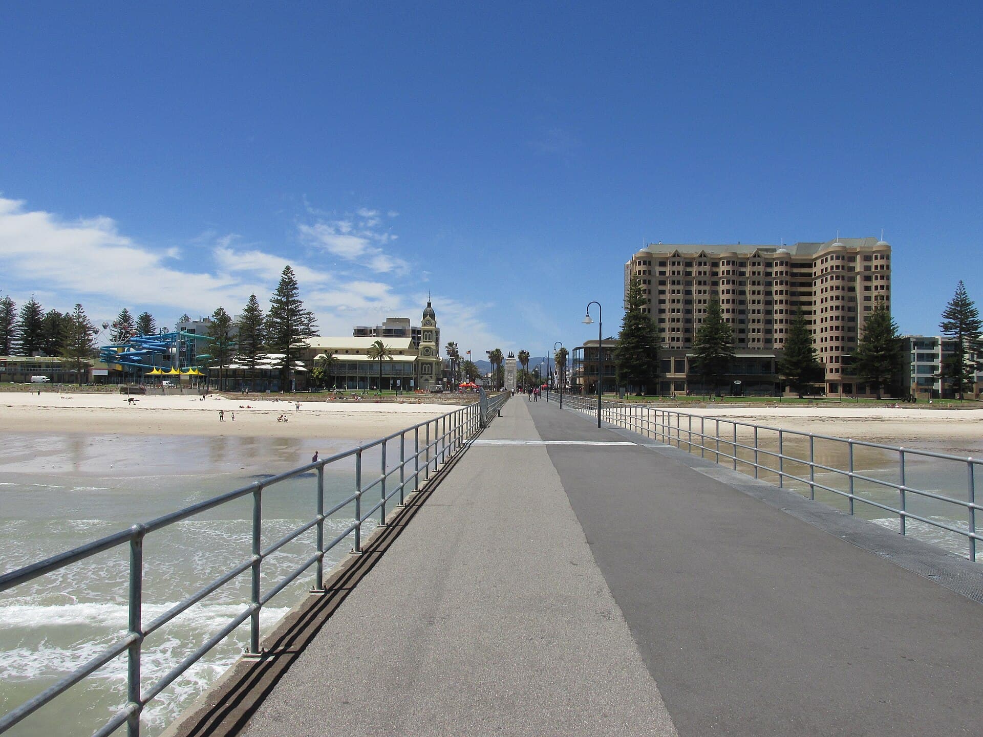 Glenelg jetty stretching into Gulf St Vincent, Adelaide bayside chauffeur service area