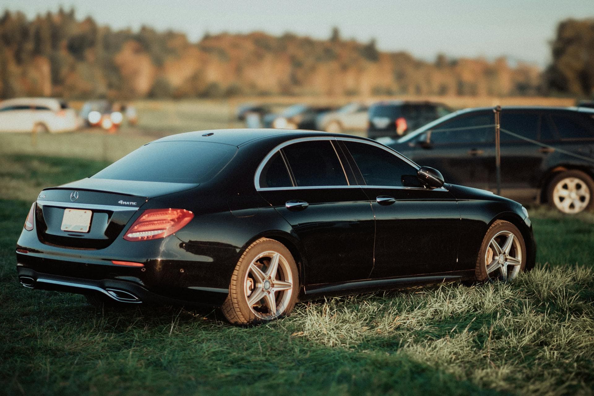 Black Mercedes sedan parked in scenic Adelaide setting, contact Limo Hire Adelaide