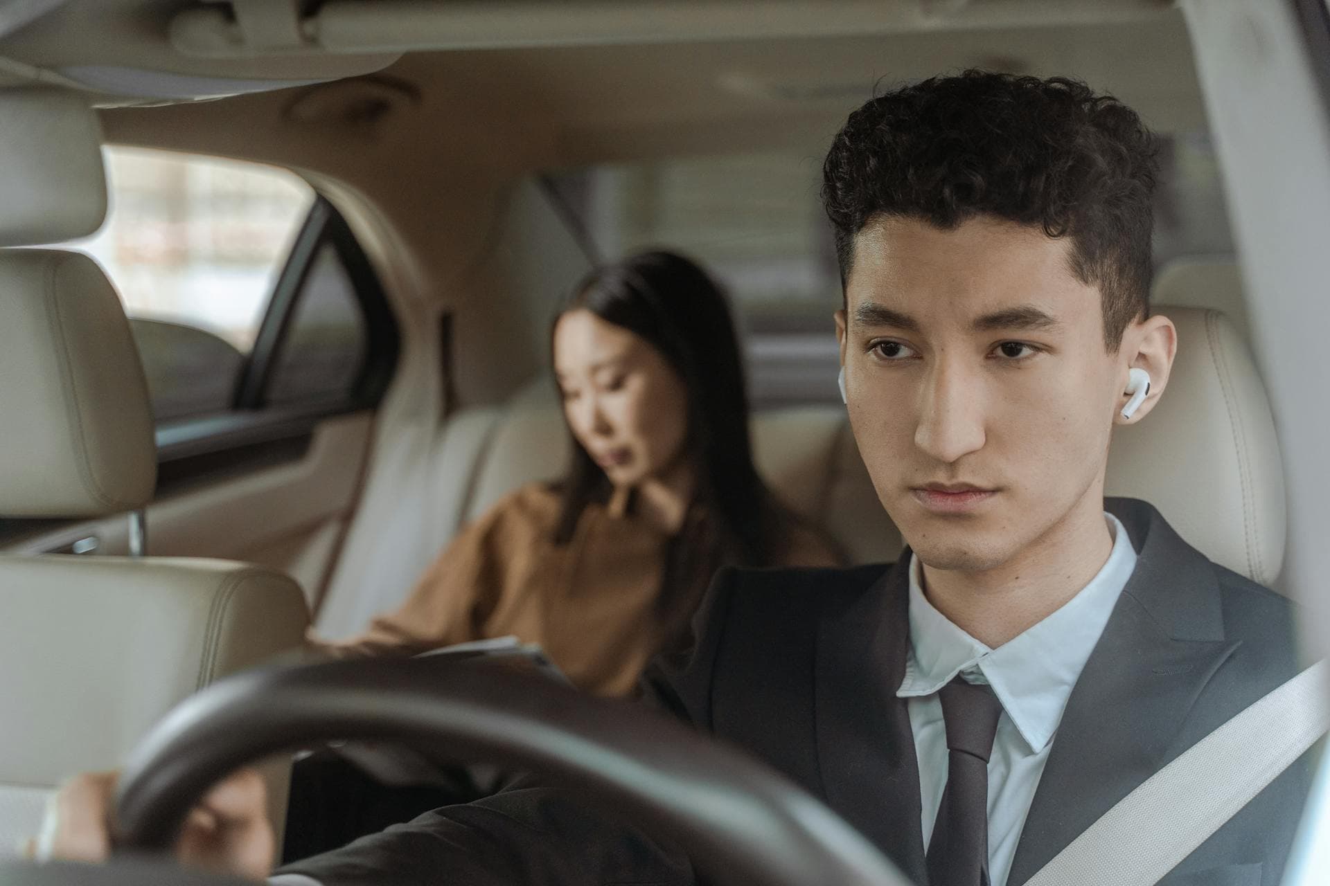 Adelaide chauffeur professional portrait with luxury automobile, Limo Hire Adelaide story